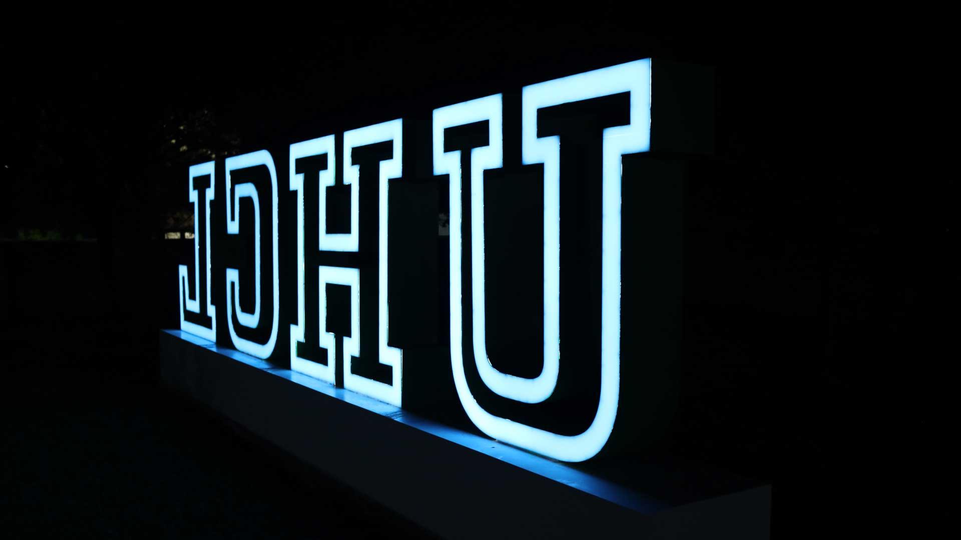 UHCL letters lit up at night